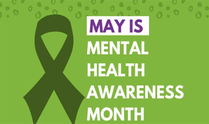 May is Mental Health Awareness month with a dark green ribbon